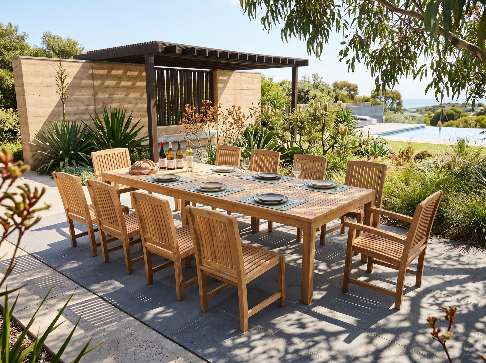teak rectangular outdoor dining table in outdoor setting