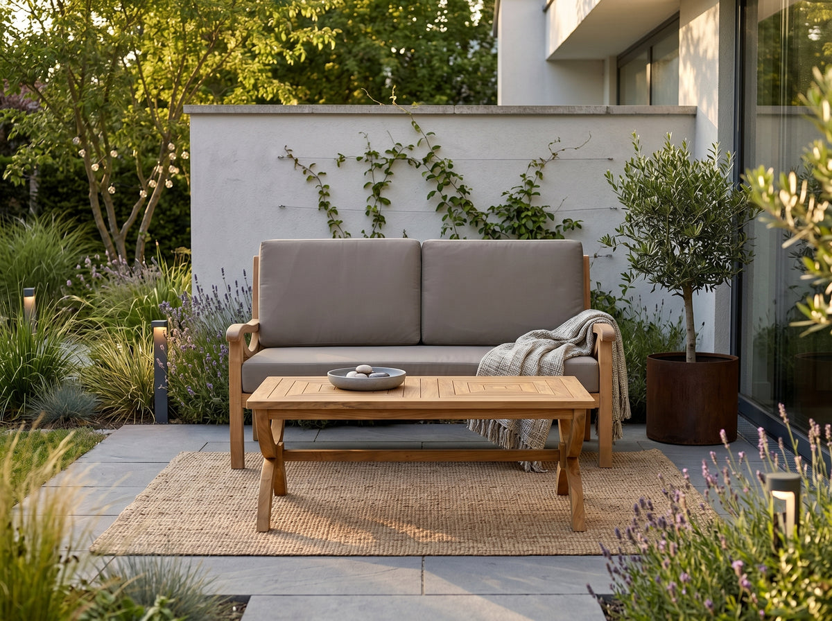 teak Paris rectangular outdoor coffee table in outdoor setting