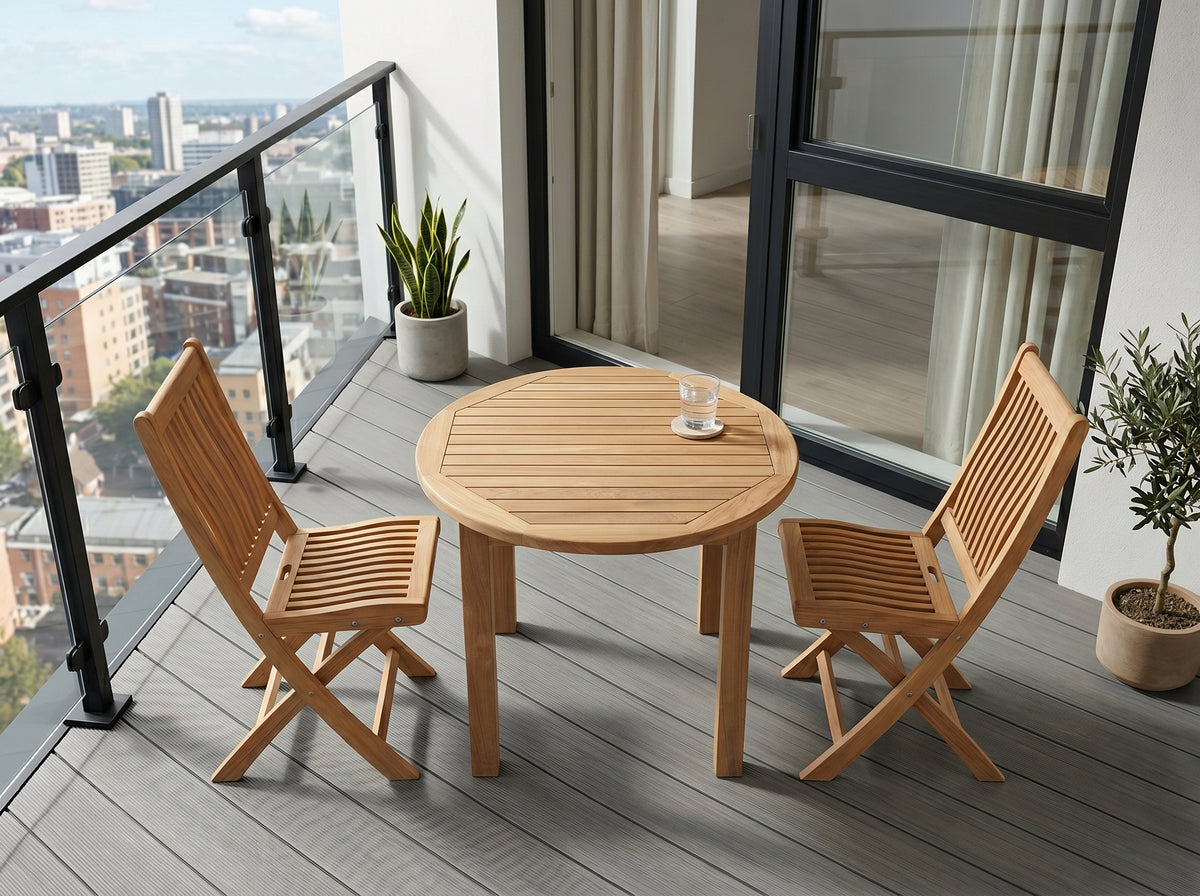 teak fixed round patio table in outdoor setting