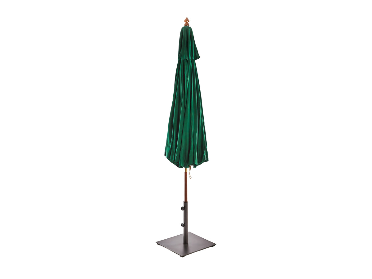 Green market umbrella closed on its wooden pole and square black base