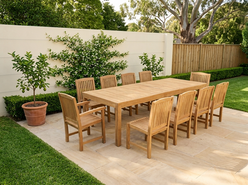 Deluxe rectangular teak dining table 240 cm with eight Japan dining chairs and two Japan armchairs in a sunny backyard