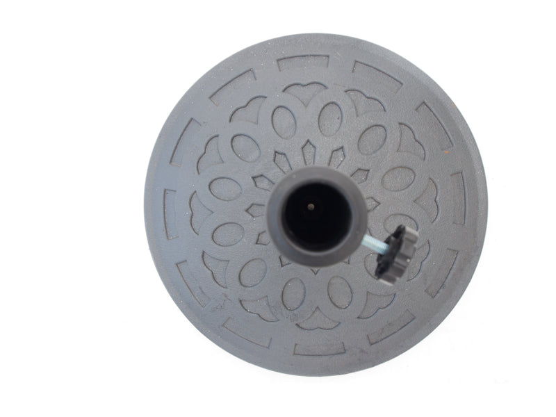 Round outdoor umbrella stand from above, showing the cast pattern